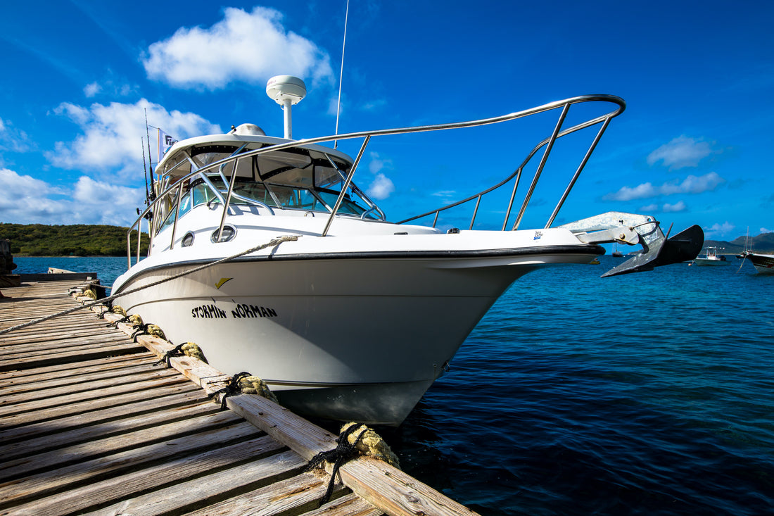 Boat tied to a dock using a mooring system