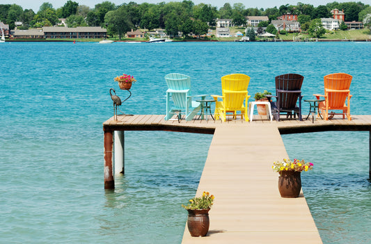 Colorful dock furniture at the end of a t-shaped dock. 